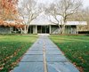 Modern home with Exterior, Mid-Century Building Type, House Building Type, and Flat RoofLine. Miller House Front Facade Photo 4 of Miller House