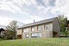 Modern home with Exterior, Gable RoofLine, Wood Siding Material, and House Building Type. The house's simple gable form helps the house blend in with its neighbors. Photo of Sven Matt's Simple Gabled Home