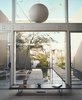 Modern home with Living Room, Bench, and Pendant Lighting. Opdahl House Interior View of Courtyard Photo 8 of Opdahl House