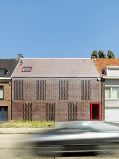 The facade of a house in Belgium consists of "knitted bricks."

“In this part of Belgium, 90 percent of the houses are built with brick,” says architect Tom Verschueren. “It’s a classic material that we tried to use in House BVA in a totally different way.”