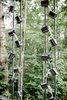 Modern home with Outdoor. The "Tippy Cup Rain Chain" teaches the children about water conservation. Photo 6 of Sustainability Treehouse