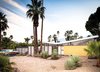 Modern home with Exterior, House Building Type, Mid-Century Building Type, and Butterfly RoofLine. A tract house with a butterfly roof designed in 1956 for Joe Dunas. Photo of Midcentury Lovers: You Can Thank This Architect for Transforming Palm Springs Into a Modernist Hotbed