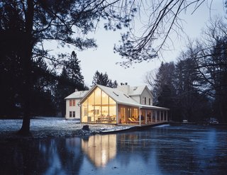 Nicknamed the Floating Farmhouse, this 200-year-old home inspired one former copywriter to delve into architecture as a living. Inside, renovator and owner Tom Givone mixes vintage and industrial decor. Photo by Mark Mahaney.