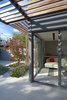 A trellis made of ipe was designed to shade the interior from high summer sun; it’s one of several passive climate-control strategies employed by Dubbeldam. Along with a radiant heating system, they make the house extremely energy-efficient. Photo of Through House in Toronto, Canada modern home