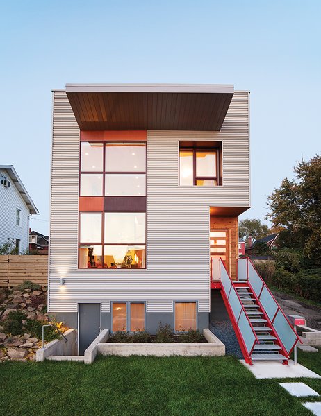 By using salvaged materials—such as a steel staircase—and doing much of the work themselves, Andrew Moss and Michelle Yanefski built their house in Pittsburgh’s Lawrenceville neighborhood for $135 per square foot.