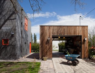 Just adjacent to the house is Whitlock's small shed which houses many of the tools that he used to build the home.