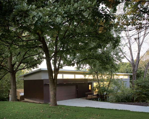 The entry bridge leading to the front door was made from timber salvaged from Christian’s parents’ farm near Kingman, Kansas.