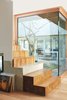 Modern home with Staircase and Wood Tread. The courtyard offers a glimpse of nature from nearly every angle, including up. Photo of Architect Spotlight: Byoung-soo Cho