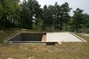 Modern home with Exterior, House Building Type, Cabin Building Type, and Green Roof Material. A square hole in the ground and a concrete slab are all that demarcate Byoung Cho’s Earth House from the surrounding countryside. Photo of Architect Spotlight: Byoung-soo Cho
