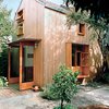 Modern home with Exterior, House, Shingles Roof Material, and Wood Siding Material. Outside, the couple clad the house with a rain screen of 1.5-by-1.5-inch strips of spruce to create a “modern rustic barn.” The extra-deep sills of the first-floor window become a bench on the outside and a shelf on the inside. Photo of Inside 5 Tiny Homes, All Under 600 Feet