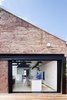Although little was done to alter the building’s original form, the firm did demolish an extension that was the site of a mechanical plant. This alteration allowed for an outdoor deck covered with timber decking by Chemisys Group. Photo 6 of Water Factory modern home