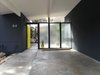Modern home with Exterior, Mid-Century Building Type, and House Building Type. Glass walls divide up the spaces throughout the home. Photo of DIY All-Stars! A Family Rolls Up Their Sleeves and Restores an Eichler