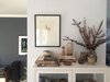 Each corner of every space is carefully arranged. "Most of the things I own are on display at all times, so I'm very particular about what I buy and how each vignette in a room is composed," says Young. Photo of This Oakland Bungalow Is a Treasure Trove of Thrift Store Finds and Heirlooms modern home
