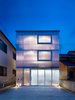 Modern home with Exterior, Flat RoofLine, and House. A glowing home in Japan has milky-white, one-and-a-half-inch plastic sheets wrapped around the exterior to let in light and provide insulation. Photo of 16 Funky Facades