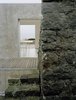 Strategic openings on the ground floor provide a clear view of the ocean. Photo of This Modern Coastal Escape Sits Within 18th-Century Stone Walls modern home