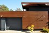 Modern home with Exterior, House, and Wood Siding Material. Designed in 1960, the house was originally a lodge to accommodate horse trails. Throughout the years, the house has expanded with various additions and renovations. Photo of A Couple Reclaims Bowling Alley Floors for Their Family's Bedrooms and Even Saves Some for a Custom Bench