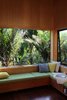 Bachs, seasonal beach houses that line New Zealand's ample coastlines, are small by nature, but this one in Auckland felt a bit too confined. The residents called in Carolyn Gundy of C Architecture to plot an addition that adds extra living space and a ton of volume. Photo of A Little Kiwi Beach House Beefs Up Big Time modern home