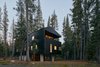 The exterior timber cladding is coated with black tar, a traditional Norwegian treatment. The finish serves a variety of purposes: solar heat gain, water resistance, and insect repellant. Photo of Here's What Norse Mythology and Modern Architecture Have in Common modern home