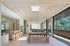 “The owners were looking for a relaxed, welcoming environment. We suggested an interior atmosphere that is simultaneously cozy and airy. We went for a stripped down, almost purified aesthetic. Simplicity is luxury.” Interior designer Lexie Mork-Ulnes says. Photo of Here's What Norse Mythology and Modern Architecture Have in Common modern home