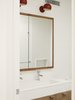 Modern home with Bath Room. Another incorporation of the original fir beams can be seen in the bathroom’s medicine cabinet frame. An oak vanity and David Weeks Studio Boi sconces complete the space. Photo of It's Back to Basics for This 1901 Brooklyn Town House