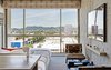 The Line Hotel, Los Angeles
The best design aspect of The Line Hotel, conceived by designer Sean Knibb, is its floor to ceiling windows, making the palm trees and Hollywood hills a key visual component in every room. Cloth lanterns and Mexican blanket chairs accent the otherwise simple interiors. For additional details, The Line turns to a host of artist collaborators who create everything from sculptural paperweights to water color prints. Photo of The 10 Best-Designed Hotels in America modern home