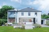 In Surrey, England, OB Architecture married a two-story addition to a historic home with a frameless glazed link. The roof was retiled in slate. Photo of Think a Victorian Villa Can't Be Made Modern? Think Again modern home