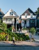 Modern home with Exterior, House Building Type, and Gable RoofLine. In Vancouver’s Strathcona district, two side-by-side lots now hold seven residences—thanks to a thoughtful renovation of a pair Edwardian houses and the addition of a laneway, or alley, building by Shape Architecture. The team salvaged as much 120-year-old siding as they could for use on the street-facing facades. Photo of Modern Spaces in the Pacific Northwest