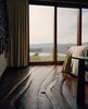 Modern home with Bedroom, Bed, and Medium Hardwood Floor. Open to the valley, the home lets the Shopes fully experience the seasons, even the sound of the Hudson River’s ice cracking in winter. Photo of Our Favorite Bedrooms