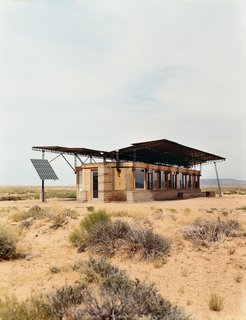 Entirely off the grid, the house is powered by four photovoltaic panels that supply electricity to lights, small appliances, and water pumps.