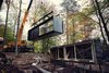 Modern home with Exterior, House Building Type, Cabin Building Type, Prefab Building Type, Metal Roof Material, Metal Siding Material, and Glass Siding Material. It takes three to five days to install a Vipp Shelter onsite. Photo of Prefab Gets a Makeover With Danish Industrial Design