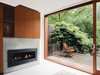 Modern home with Doors, Exterior, Wood, and Sliding Door Type. Mandel designed a six-by-eight-foot extension for additional space on the ground floor. Photo of Cozy Fireplaces