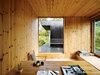 Modern home with Office and Desk. The 1950s desk in the office is from the original house; the chair is by Aksel, a Norwegian furniture company. Sævik designed the pencil holder. Photo 2 of 430 Cabin