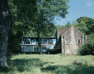 Moonshine is beautifully set in an isolated spot in the English countryside outside of Bath. The dramatic juxtaposition of a stone gamekeeper's cottage and a modern, timber-framed addition gives the home a pastoral feel while capitalizing on the dramatic view of St. Catherine's Valley.