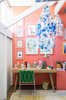 Modern home with Kids Room, Girl Gender, Desk, Chair, Lamps, Carpet Floor, and Rug Floor. The kids' room is especially vibrant, with Tango-painted walls by Delux, artwork by Rachel Castle and Beci Orpin, handmade beaded chandeliers by Emily Green, and a kicky pineapple lamp by Down to the Woods. Photo by Phu Tang. Photo of 17 Stellar Uses of Color in Home Offices