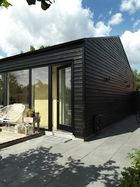 Since Copenhagen is generally cold, the house was painted black to trap warmth. The result was that in its first year, it consumed so little energy that the client received a generous refund from the heating company. 