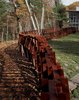 Modern home with Outdoor, Metal Fences, Wall, and Hardscapes. Landscape architect and artist Mikyoung Kim created a Cor-ten steel fence to enclose a three-acre site in Lincoln, Massachusetts. “The entire fence is made using just seven lengths of modular, precut Cor-Ten steel bars, with widths being anywhere from two to five bars thick," explains the designer. "Depending on the angle from which you see it, the fence can appear transparent or opaque.” Read the full article here. Photo of Steel Yourself