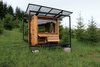 Modern home with Exterior, Cabin Building Type, Tiny Home Building Type, Wood Siding Material, Flat RoofLine, and Glass Siding Material. Erin Moore of FLOAT Architectural Research and Design, based in Tucson, Arizona, designed a 70-square-foot writer’s retreat in Wren, Oregon, for her mother, Kathleen Dean Moore, a nature writer and professor of philosophy at nearby Oregon State University. The elder Moore wanted a small studio in which to work and observe the delicate wetland ecosystem on the banks of the Marys River. Enlisting her daughter’s design expertise, her professor husband’s carpentry savoir faire, the aid of friends, and a front loader, Kathleen and her crew erected the structure in September 2007. Photo by Gary Tarleton. Totally off the grid—–Kathleen forgoes the computer and writes by hand when there—–the Watershed was designed to tread as lightly on the fragile ecosystem as the wild turkeys and Western pond turtles that live nearby. “ Photo of Inside 5 Tiny Homes, All Under 600 Feet