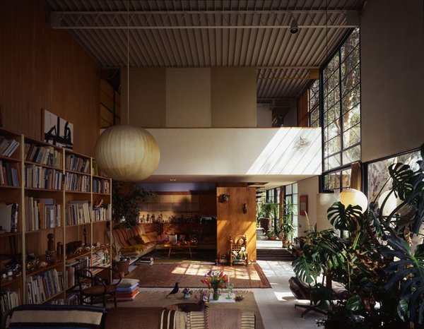 The Eames house living room as it is best known, shot in 1994. The light from the window illuminates the tumbleweed the couple picked up on their honeymoon drive from Chicago to Los Angeles; due to its fragility it was the only item not to have been moved to the LACMA exhibition. Photo courtesy Tim Street-Porter.