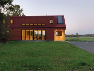 "Like the old farmhouses and barns of the Champlain Valley, the Foote Farm House has a clearly ordered wood frame on a sturdy foundation, an exterior skin made of local materials, an economy of form with tried-and-true proportions, a central fire place, and a common-sense relationship to the sun and the weather." - Architect John McLeod