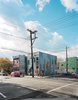 The HardiePanel siding on the adjacent 100K and 120K houses is a dramatic break from East Kensington’s mostly brick facades. The simple, well insulated box and the absence of a third floor keep each house affordable, sustainable, and within the reach of young families. Photo of Unbelievably Green Housing Developments modern home