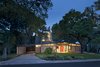 Modern home with Exterior, House Building Type, and Mid-Century Building Type. A 1960s midcentury home in Austin was renovated by local practice Webber + Studio, with a second story added while preserving the home’s original character. Photo of Renovated Midcentury Home in Austin Doubles Square Footage