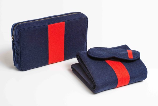 Parachute x Clare V. Travel Kit, $199 at parachutehome.com

Crafted from cozy 100% Merino wool, this design is a collaboration betweeen Parachute and Los Angeles-based designer Clare Vivier. Vivier's signature bold colors grace a blanket and eye mask whose carrying case doubles as a pillow.