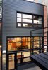 The rear addition is clad in James Hardie’s Fiber Cement siding. Photo 10 of Lakeview modern home