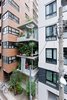 A series of open, street-facing gardens make up this five-story, 700-square-foot home in Tokyo, Japan. Called Garden & House, it was designed by Ryue Nishizawa, and serves as part of a study of new urban lifestyles for the non-nuclear family. Photo of These Contemporary Homes Defy Convention modern home