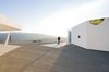 A series of diagonal slices characterize this heptagonal house in California. Designed by Michael Maltzan, it's home to artists Lari Pittman and and Roy Dowell. While the seven-sided exterior features few openings, the interior abounds with skylights and courtyards. Photo of These Contemporary Homes Defy Convention modern home