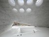 Placed beneath a series of circular skylights, the sunken bathtub in this Stuttgart, Germany home designed by Matthias Bauer of MBA/S Associates is the stuff of dreams. Photo of These Contemporary Homes Defy Convention modern home
