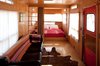 Modern home with Bedroom and Bed. By reducing the bedroom to its essentials and filling it with windows, the El Cosmico staff has made this small space as expansive as the desert beyond. Photo 3 of El Cosmico