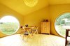 The interior of Jaanus Orgusaar's NOA cabin in the Virumaa region of Estonia. The wide windows provide a great view of the surroundings. Photo of Inside 5 Tiny Homes, All Under 600 Feet modern home