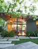 Modern home with Outdoor, Large Patio, Porch, Deck, Pavers Patio, Porch, Deck, and Grass. Usha and Mike Kreaden had a virtually blank slate when it came to the garden outside the 1958 Joseph Eichler house that they bought in Silicon Valley two decades ago. Photo of Modern Master: Joseph Eichler