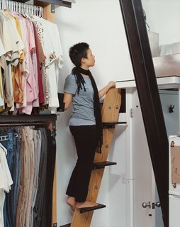 The stairway to the sleeping loft is a riff on a ship's ladder: "We spent a lot of time figuring out how much space we need to maneuver," says David. "It allowed us to make it as small and perfect as we wanted to." Instead of a handrail, sail cleats are bolted to the walls as hand-holds.